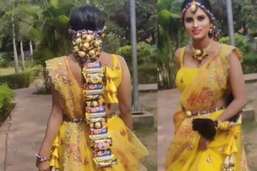 অনন্য হেয়াৰষ্টাইলত ‘কিট কেট’, ‘৫ ষ্টাৰ’, ‘মিল্কিবাৰ’ আৰু ‘ফেৰেৰো ৰোচাৰ’ৰ দৰে ব্ৰেণ্ডৰ চকলেটৰে সজ্জিত চুলিৰ এটা ষ্টাইল কৰা আছে।