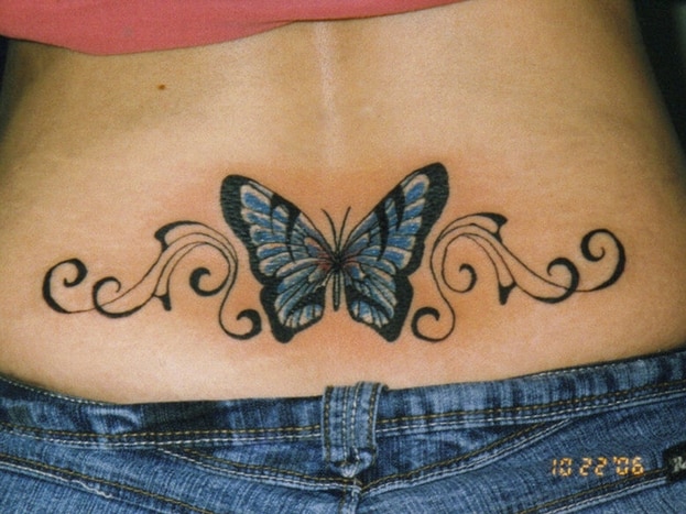 What does it mean for a woman to have a tattoo of a butterfly on her lower  back side? - Quora