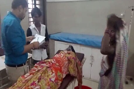 अस्पताल में भर्ती जमना आदिवासी, पीड़ित महिला
फोटो- ईटीवी