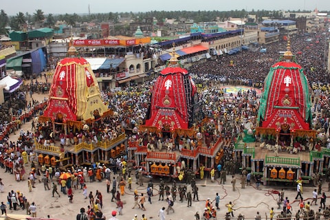 Devotees take part in the annual Rath Yatra, or chariot procession, in Puri.( REUTERS)