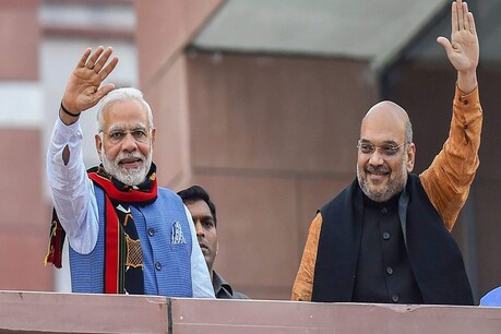 प्रधानमंत्री नरेंद्र मोदी के साथ अमित शाह (Twitter)