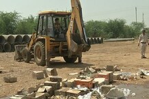 PHOTOS : एक करोड़ की शराब पर जब चली  जेसीबी मशीन...