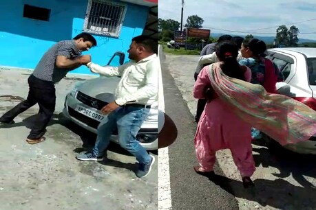 कांगड़ा के देहरा में शख्स को पीटती महिला.