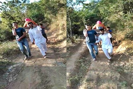 बिलासपुर. घायल महिला को कंधों पर उठाकर मुख्य मार्ग तक ले जाते युवक.