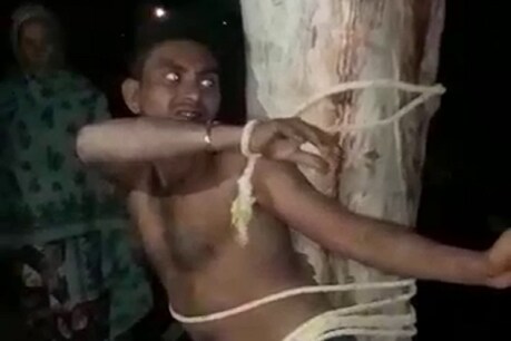 नूंह: चोर को पेड़ से बांधकर लोगों ने की पिटाई, Video Viral नूंह: चोर को पेड़ से बांधकर लोगों ने की पिटाई, Video Viral