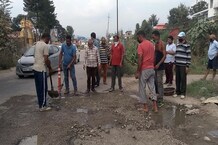 PHOTOS: CM जयराम के जिले मंडी में प्रशासन की नाकामी, लोगों ने भरे NH-21 पर पड़े गड्ढे