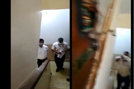 अधिकारियों ने शनिवार को दिवगंत फिल्म प्रोड्यूसर ओ पी रल्हन की पत्नी के घर का मेन गेट तोड़ दिया. (फोटो साभारः@vivekanandg)