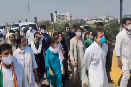 हाथरस के लिए पैदल ही जाते राहुल और प्रियंका को पुलिस ने हिरासत में लिया. (Pic: Video Grab)