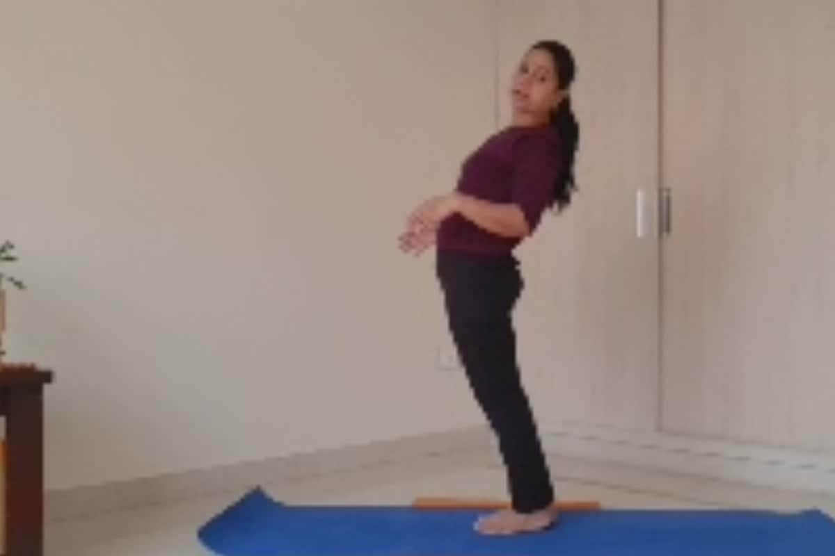 Ayuryoga - Dwikonasana (double angle pose) Stand erect with the feet one  foot apart. Extend the arms behind the back and interlock the fingers. This  is the starting position. Bend forward from