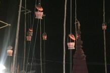 Photos: जानिए कार्तिक के महीने में बनारस में क्यों लटकते हैं बांस के ऊपर टोकरी में दीये