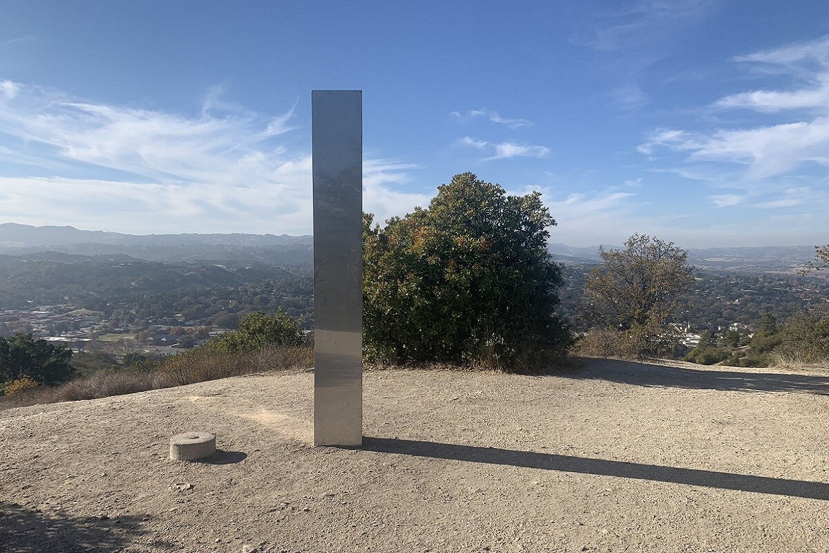 World, USA, Romania, Britain, Europe, Monolith Shiny metallic pillar,