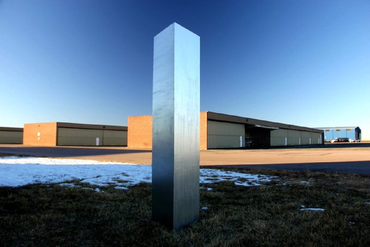 USA, Romania, Britain, Europe, Monolith Shiny metallic pillar,