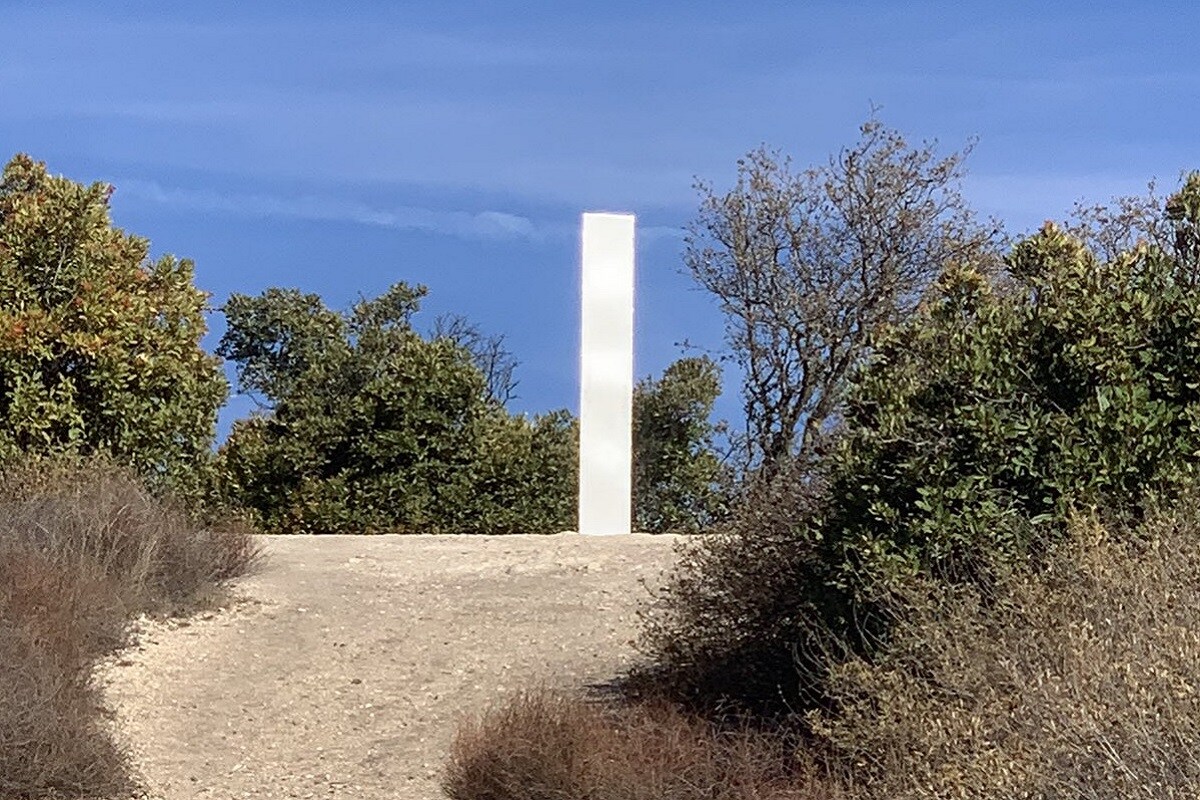 World, USA, Romania, Britain, Europe, Monolith Shiny metallic pillar,