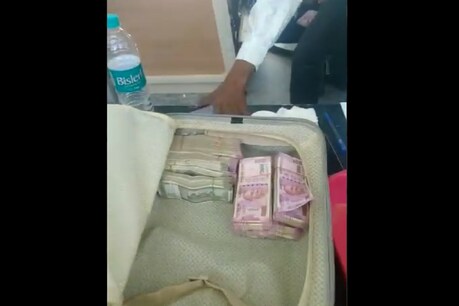 कस्टम अधिकारी के पास से करीब 75 लाख रुपये जब्त किए गए. (Photo- ANI Video Grab)