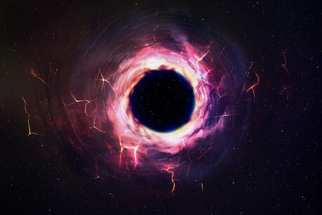 ब्लैक होल (Black Hole) का पदार्थ का निगलना हमेशा एक ही जैसा नहीं होता है. (प्रतीकात्मक तस्वीर: shutterstock)