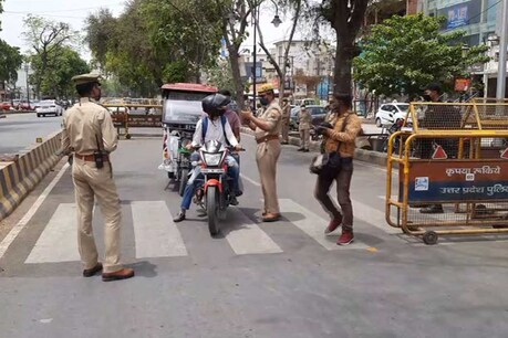 प्रयागराज में मास्क को लेकर चौकसी बढ़ायी गई.