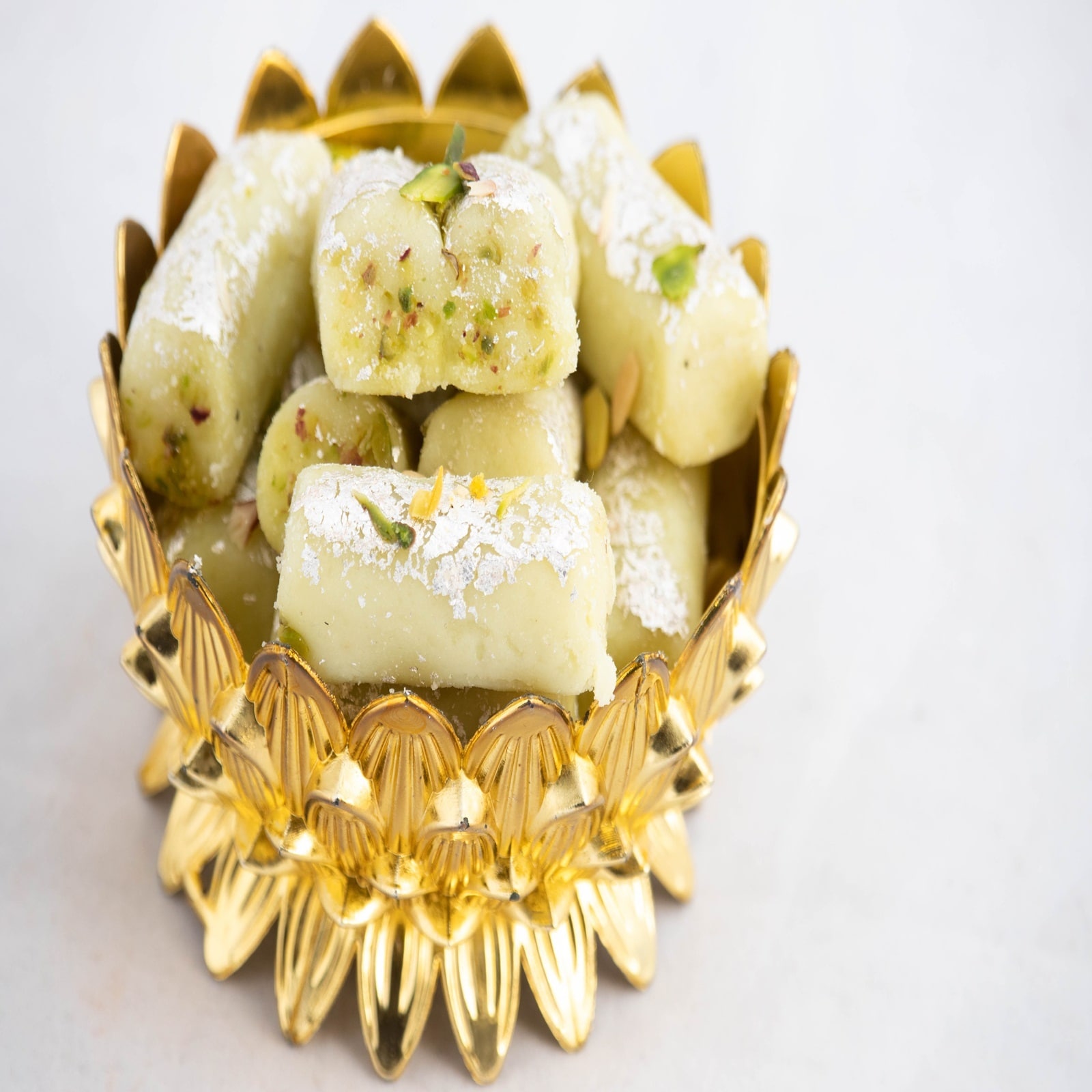 Kaju Pista Roll Recipe: A lot of dry fruits are added to the cashew pistachio roll. Along with giving a lot of energy, they are also tasty. Sweets prepared from cashew pistachios are easily available in the market, but these days many people are avoiding sweets made in the market. In such a situation, we can make it for you at home. (Image - Shutterstock)