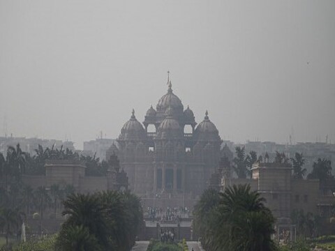 दिल्ली में अक्षरधाम मंदिर (Photo by Money SHARMA / AFP)