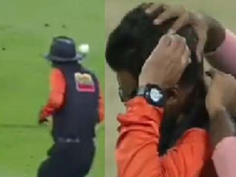 गेंद लगने के बाद अंपायर अलीम डार  (pc: video screenshot)