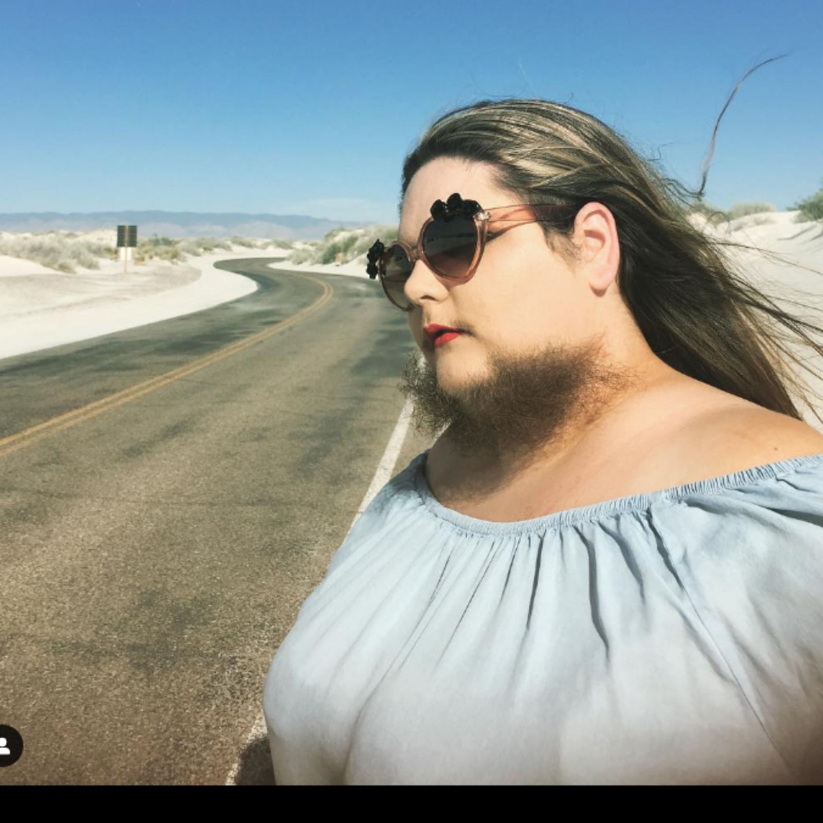 beard grew on woman's face