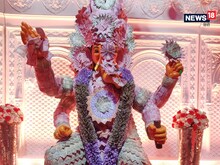 गणपति बप्पा ने पहनी 33 लाख रुपये के नोटों से बनी ड्रेस, देखें अनूठी PHOTOS