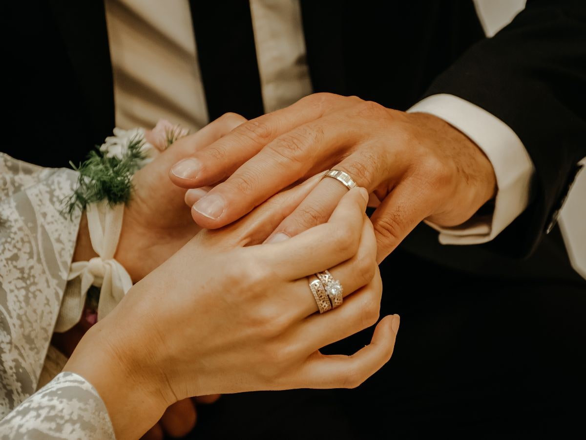 Free Photo: Woman Holding Engagement Ring in her Hand