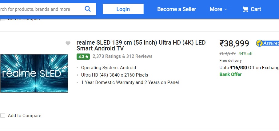 Realme SLED 139 cm (55 इंच) अल्ट्रा HD (4K) LED Smart एंड्रॉयड TV को ग्राहक 44% के डिस्काउंट पर घर ला सकते हैं. इस स्मार्ट टीवी को छूट के बाद 69,999 रुपये के बजाए सिर्फ 28,999 रुपये में खरीदा जा सकता है. एक्सचेंज ऑफर के तहत 16,990 रुपये की अडिशनल छूट पाई जा सकती है. (फोटो: Flipkart)