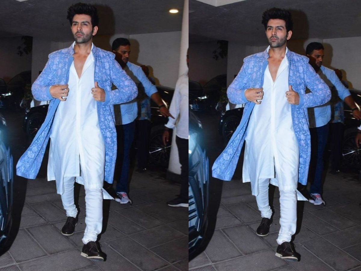आप क्लासी के साथ-साथ कूल लुक पाने के लिए सफेद कुर्ता पजामा और प्रिंटेड शेरवानी जैकेट पहन सकते हैं. हर लुक के लिए खुद की ग्रूमिंग करना न भूलें.(Image-Instagram/kartikaaryan)