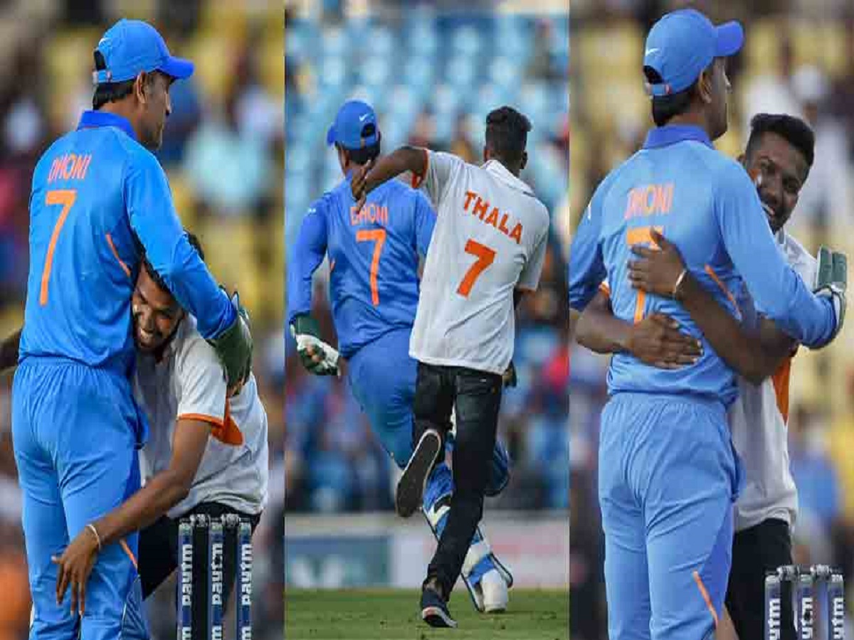  एक तस्वीर नागपुर के एक मैच की है जिसमें धोनी से मिलने के लिए एक प्रशंसक मैदान में घुस गया. पहले तो धोनी ने उन्हें छकाया, दौड़ाया फिर रुककर गले लगा लिया. इस क्षण का आनंद लेते रहे. इस फैन ने धोनी के पांव भी छुए. (फोटो- सोशल मीडिया)