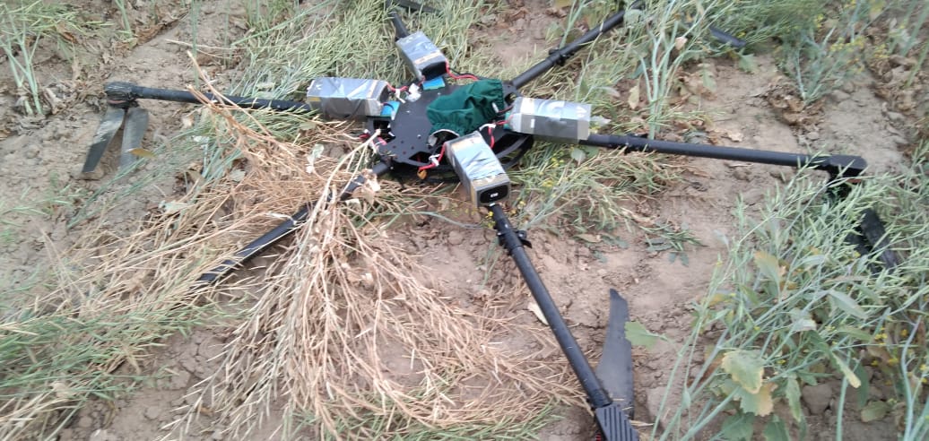 Pakistani Drone in India, Border Security Force shuts down enemy drone, BSF News, Latest News Rajasthan, Farmer Found drone in farm land, Drone carrying drugs, Narcotics Department, Heroin, Narco Drugs, Drone Caryying Heroin, Sri ganganagar News, Hindi Khabar Rajasthan, drone crime, pakistani drone shot down, drone drug smuggling, narco-drones, Pakistan Drone Found, illegal uses of drones, drone camera, drone delivery, Pakistani drones spotted in Sri Ganganagar, Top Drone On Rent, Pakistani drone shot down by BSF, श्रीगंगानगर की ताजा खबर, राजस्थान हिंदी खबर, पाकिस्तानी ड्रोन को बीएसएफ ने मार गिराया, किसान को मिला पाकिस्तानी ड्रोन, खेत में मिला दुश्मन देश का ड्रोन, हेरोइन, ड्रोन से ड्रग्स की सप्लाई, ड्रग्स तस्करी, ड्रोन से तस्करी, Drone Smuggling,