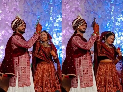 सौ.इंस्टाग्राम/mayank_purani: दूल्हे के साथ दुल्हन ने भी थामी बंदूक, फायर होते ही थर्रायी, लोगों को पसंद नहीं आया गोली दागता जमाई
