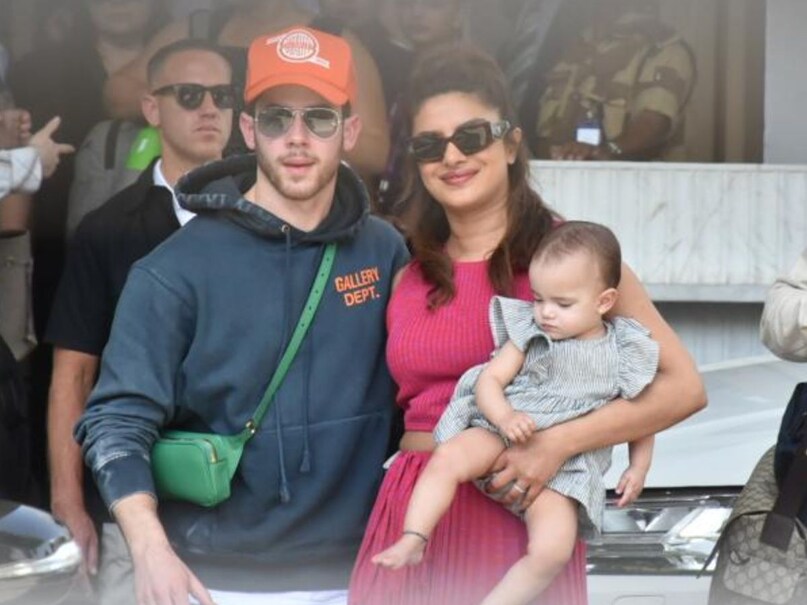 Priyanka Chopra, Priyanka Chopra Jonas, desi girl aka Priyanka Chopra, Priyanka Chopra Jonas in india, Priyanka Chopra and Nick Jonas land in Mumbai with daughter Malti Marie, Priyanka Chopra daughter Malti Marie comes in india first time, Nick Jonas, Malti Marie, Parineeti Chopra Raghav Chadha wedding, rumors of Parineeti Chopra Raghav Chadha wedding, Parineeti Chopra-Raghav Chadha Roka