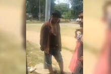 युवक को लड़की छेड़ना पड़ा भारी, लोगों ने पोल में बांधकर पीटा, वायरल हुआ Video