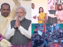 PHOTOS: 'अभिनंदन मोदी जी', PM के स्वागत के लिए पलके बिछाए बैठे रहे कार्यकर्ता