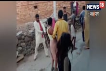 पड़ोसन को ताड़ने पर मचा बवाल, जमकर चले लाठी-डंडे, देखें मारपीट का VIDEO