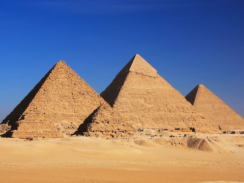गीजा के पिरामिडों का सबसे बड़े रहस्यों में से एक यह भी है कि वहां इतनी बड़ी और विशालकाय चट्टानें कैसे पहुंचीं. (प्रतीकात्मक तस्वीर: Canva)