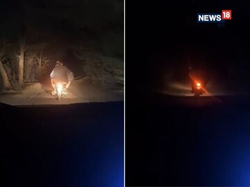 Boys having fun on a deserted road in the dark, switched off the car lights!