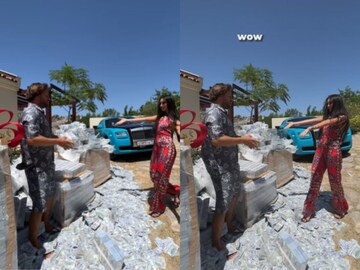 सड़क पर आदमी ने लगाया 'नोटों का बिछौना', लाल जम्पसूट में पहुंची लड़की, तभी...