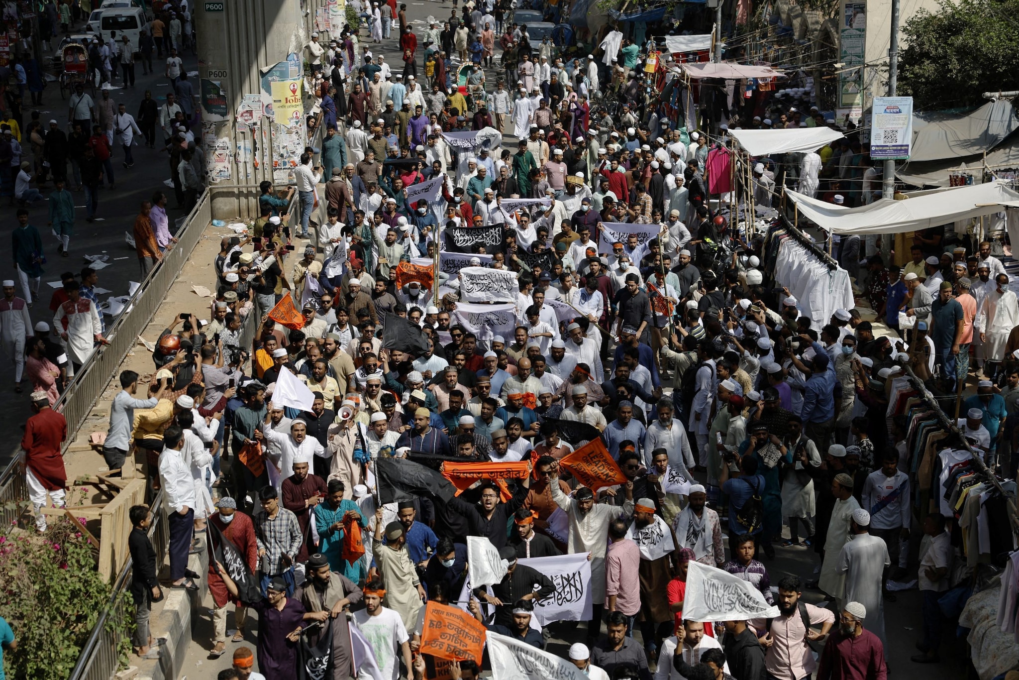 Supporters of Hizb ut-Tahrir, a banned Islamist group, attend a march demanding the establishment of the Khilafah, Islamic rule, in Dhaka, Bangladesh, March 7, 2025. REUTERS/Mohammad Ponir Hossain