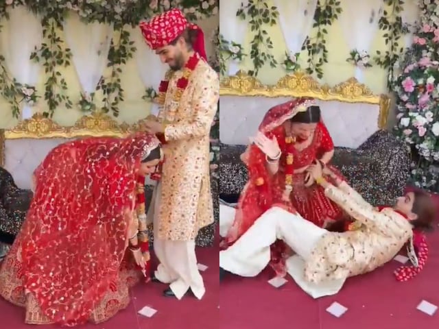 दुल्हे के पैर छू रही थी दुल्हन, फिर जो हुआ उसे देख हंस-हंसकर लोटपोट हुए लोग! दुल्हे के पैर छू रही थी दुल्हन, फिर जो हुआ उसे देख हंस-हंसकर लोटपोट हुए लोग!