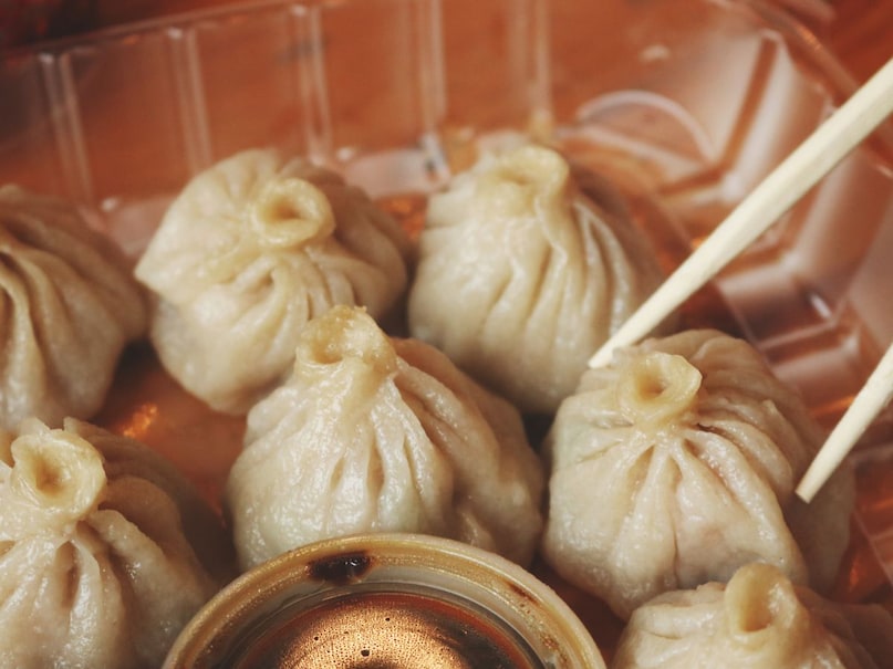 What is the Difference among Momos Dimsums Dumplings and Potstickers Street Food