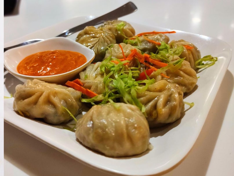 What is the Difference among Momos Dimsums Dumplings and Potstickers Street Food