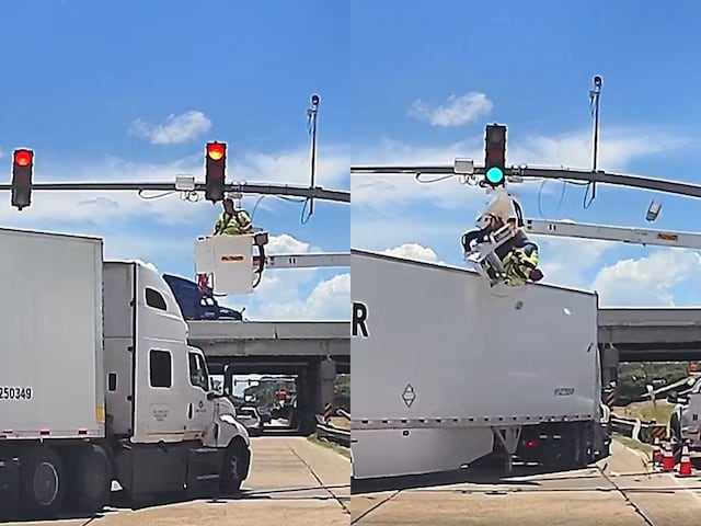 The person was fixing the signal in the US, then the truck collided, the video will surprise the video The person was fixing the signal in the US, then the truck collided, the video will surprise the video