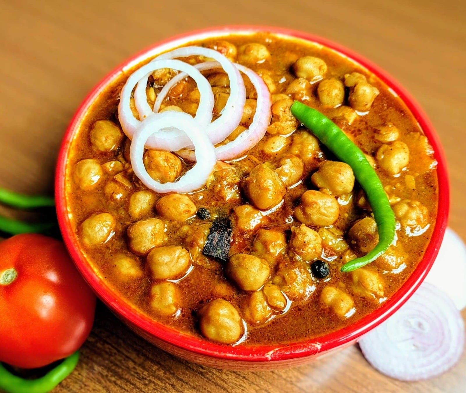 Chana Masala Recipe: घर पर बनाएं ढाबा स्टाइल चटपटा और तीखा चना मसाला, हर बाइट में मिलेगा शानदार स्वाद