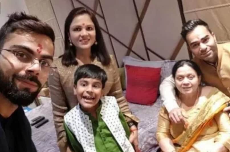 Virat Kohli with mother, brother-in-law and nephew Virat Kohli with mother, brother-in-law and nephew