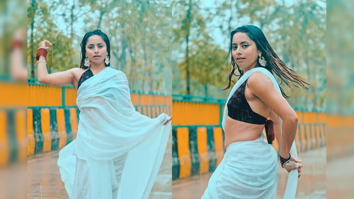 Girl Dance in Rain: कतई जहर है ये लड़की, बारिश में मटकाई कमर तो बहक गए देखने वाले