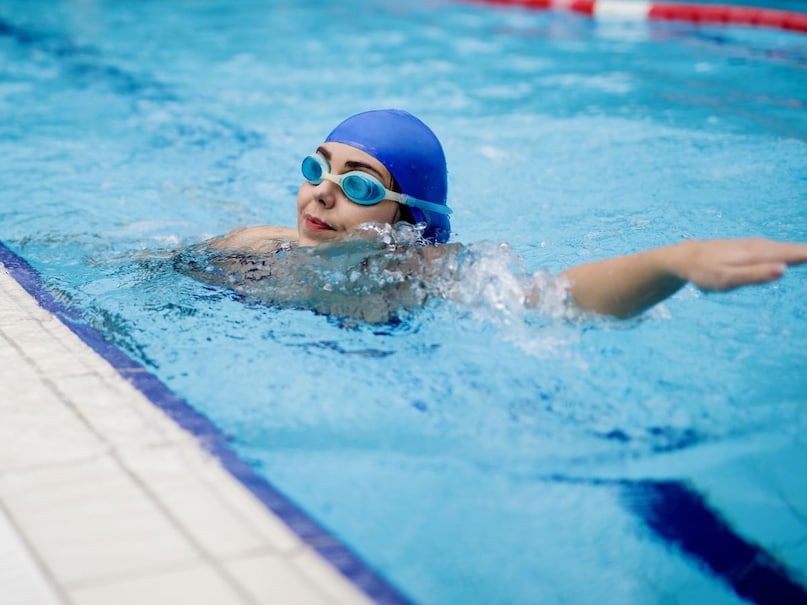 girl in swimming pool tease