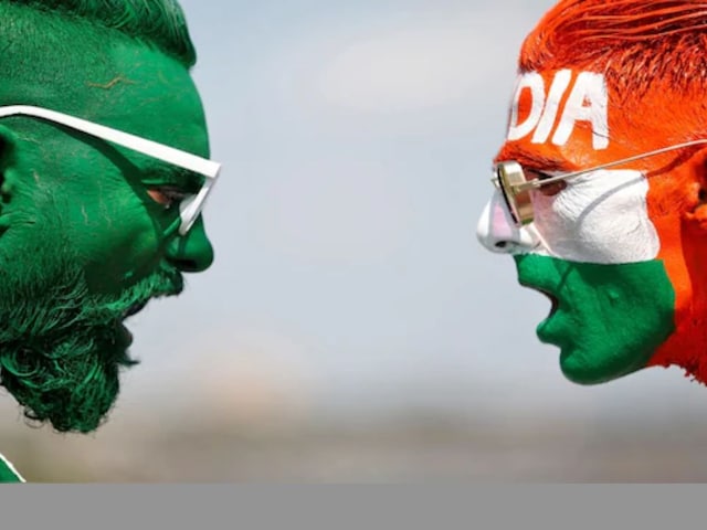 Who is heavily in the Asia Cup T20 match, India or Pakistan, whose coin is