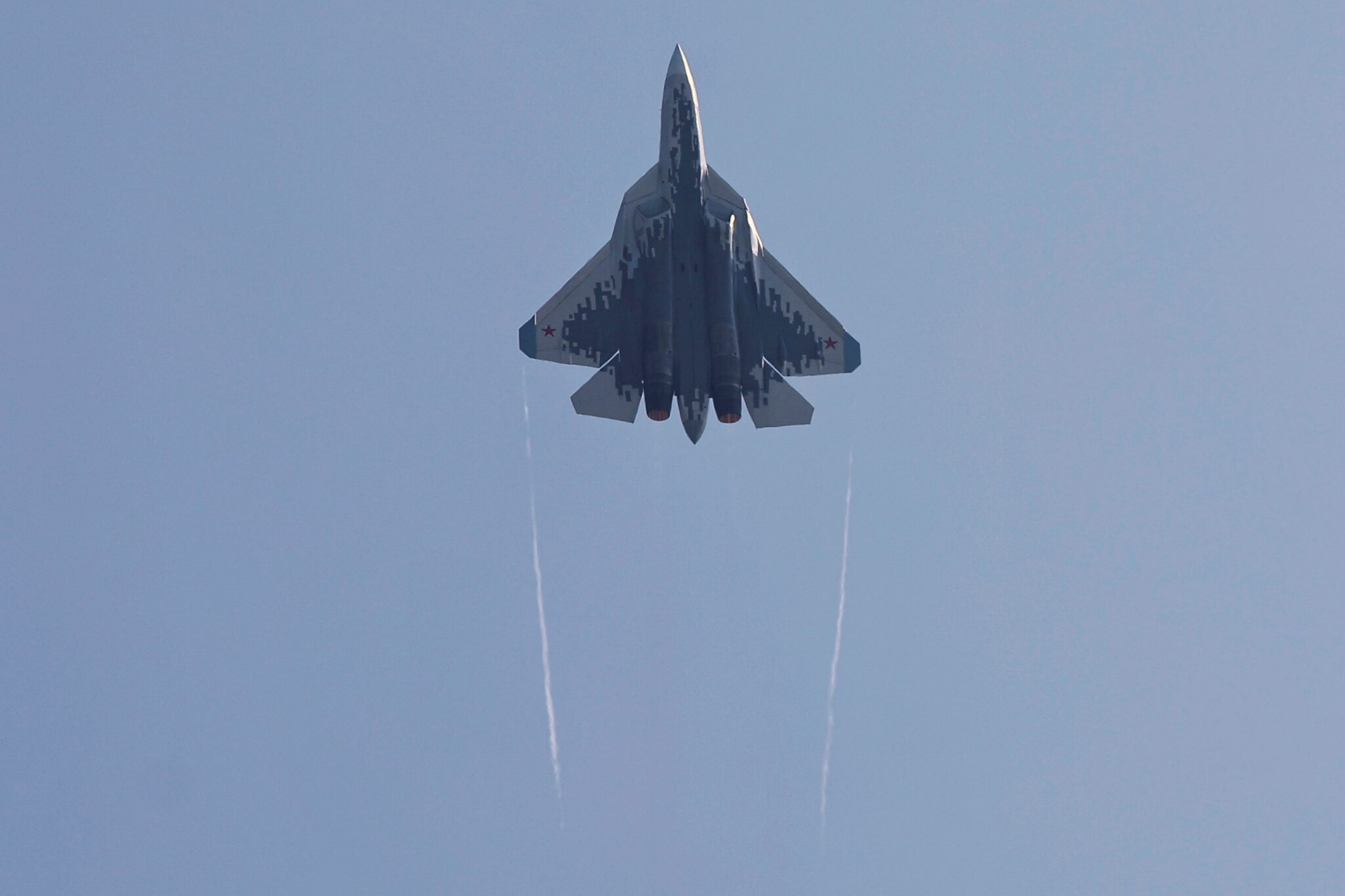 A Russian SU-57 stealth fighter jet flies in the sky at the China International Aviation and Aerospace Exhibition, or Airshow China, in Zhuhai, Guangdong province, China November 12, 2024. REUTERS/Tingshu Wang