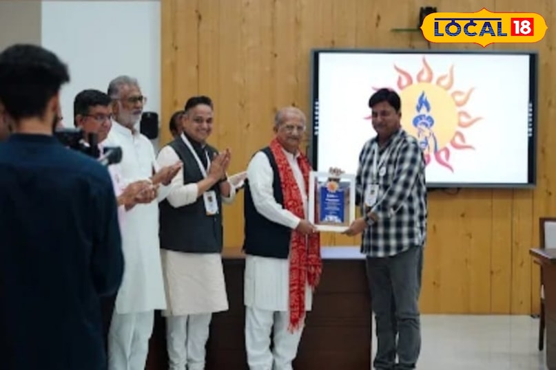 Sanjeev Dome receiving honor Sanjeev Dome receiving honor